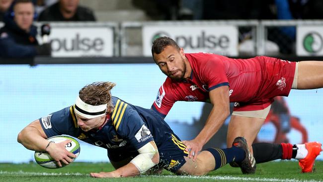 James Lentjes of the Highlanders dives over to score a try in the Kiwi side’s routine victory.