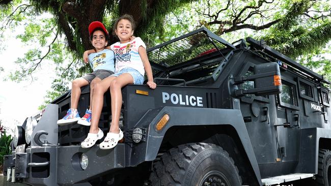 Cousins Jairus Mara and Avaini Lewis got a good look at the Queensland Police Bearcat armoured vehicle when it was parked on the Cairns Esplanade. Picture: Brendan Radke