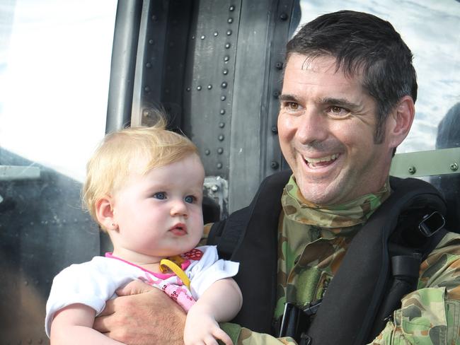 Montannah Creaser reunited with Warrant Officer Tony Young two months after her rescue.