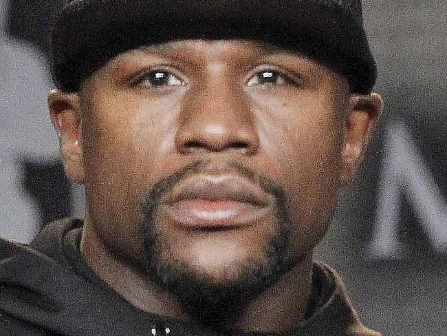 Floyd Mayweather Jr., left, and Andre Berto pose at a news conference in Los Angeles on Thursday, Aug. 6, 2015. Mayweather says Berto is a worthy opponent for the final fight of his perfect career. (AP Photo/Nick Ut)