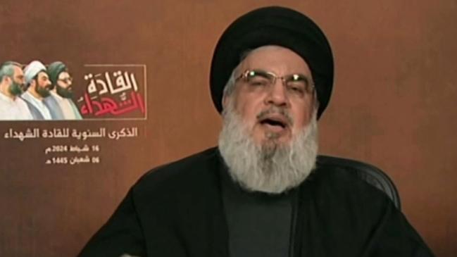 Hezbollah chief Hassan Nasrallah delivers a televised speech. Nasrallah vowed on Friday 16 that Israel will pay "with blood" for civilians killed this week Picture: AFP.