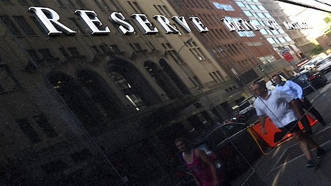 RBA leaves cash rate on hold at record low