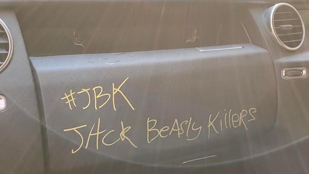 Graffiti on a stolen car found abandoned on the Gold Coast.