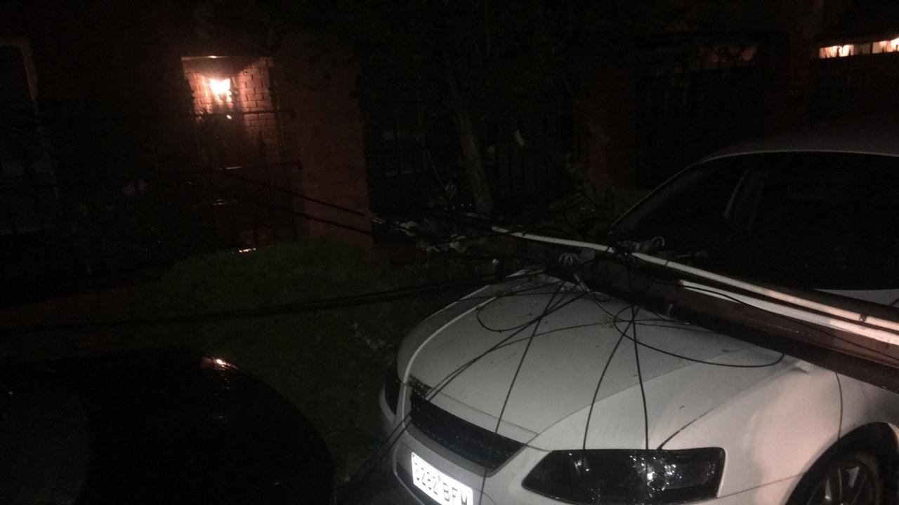 A power line down on a car at Argyle St, Prospect during the storm last night. Picture: SA Power Network