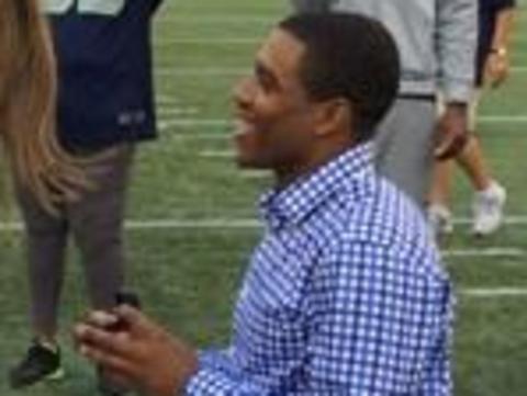 NFL player wins game, pops the question