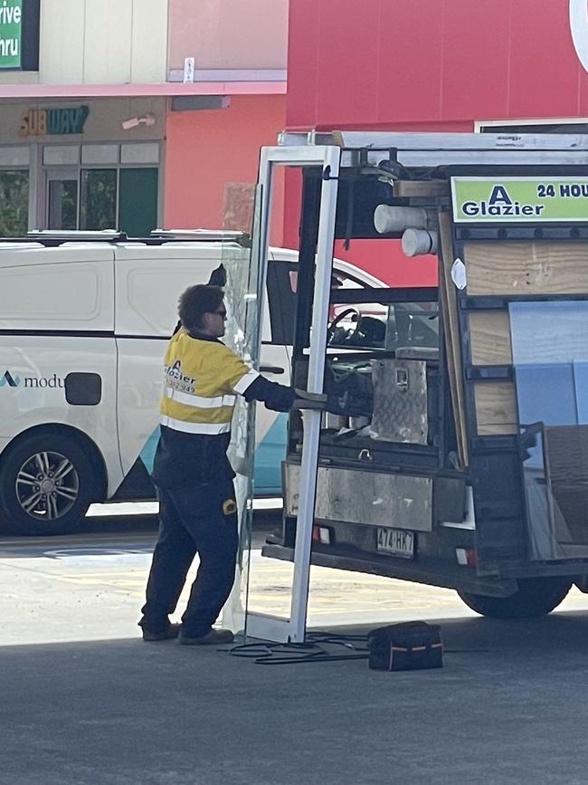 Coles Express service station, Pimpama was closed on Thursday and the shattered glass doors were replaced. Picture: Charlton Hart