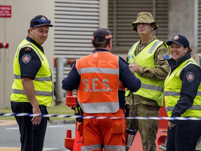 Emergency services personnel at the border of Queensland and NSW, onn Griffith St, Coolangatta. The government is pulling the Australian Defence Force personnel out of helping with the border control soon. Picture: Jerad Williams