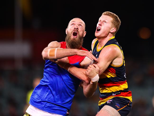 Demons captain Max Gawn and Reilly O’Brien of the Crows at Adelaide Oval