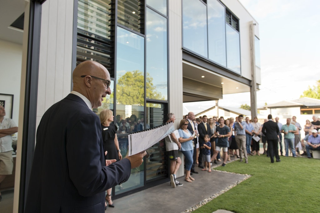 Auctioneer Phil Parker as 37 Arthur St goes under the hammer. Picture: Kevin Farmer