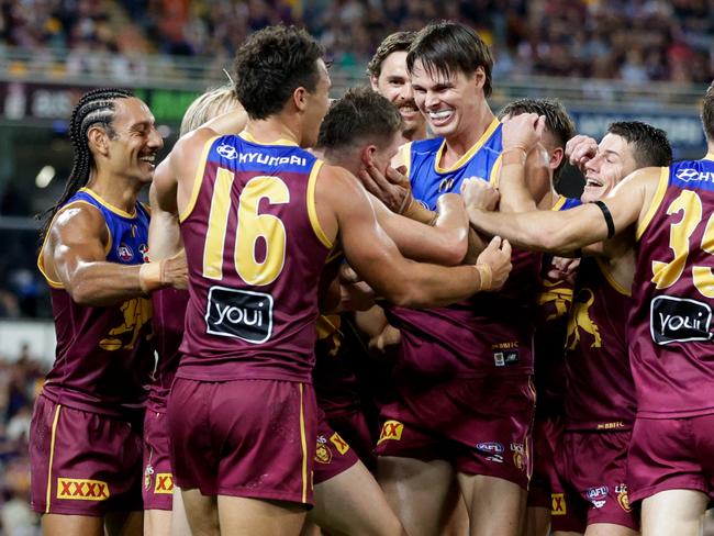 BRISBANE, AUSTRALIA - MAY 05: Logan Morris of the Lions celebrates a goal during the 2024 AFL Round 08 match between the Brisbane Lions and the Gold Coast SUNS at The Gabba on May 05, 2024 in Brisbane, Australia. (Photo by Russell Freeman/AFL Photos via Getty Images)