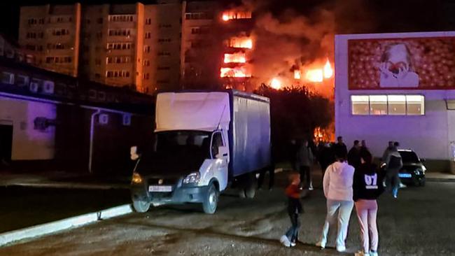 An apartment building burns in the Russian town of Yeysk after being struck by a Russian military plane. Picture: AFP