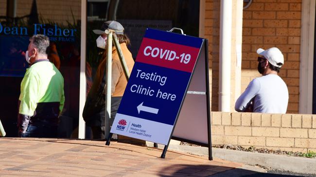 Residents queue to be tested in West Dubbo on Friday. Picture: Getty Images