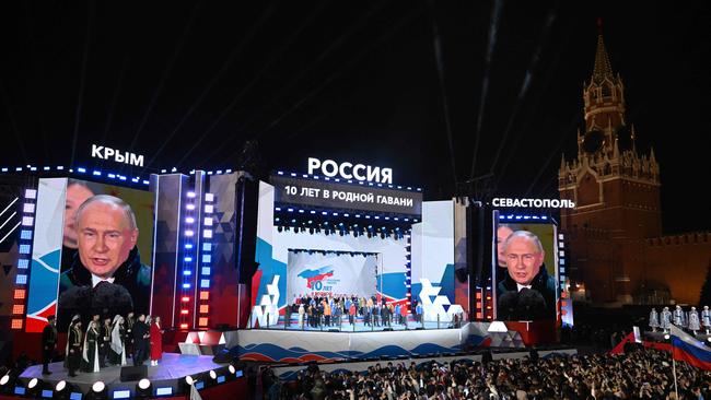 Vladimir Putin on stage in Red Square on Monday. Picture: AFP