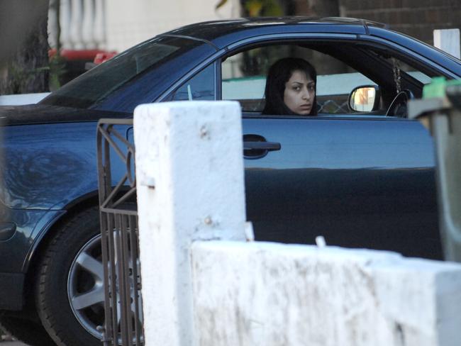 Amanda Ibrahim, girlfriend of armed robber Corey Farrell, arriving in her Mercedes at her Marrickville home.