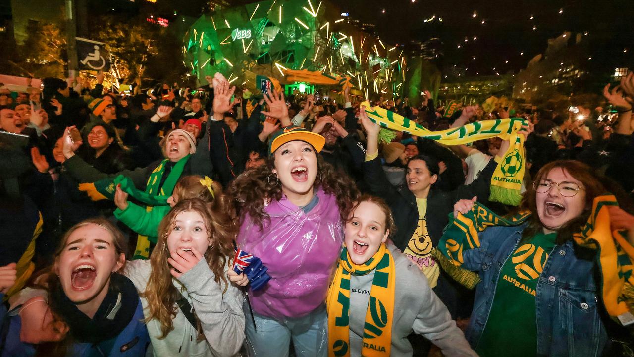 Fans watch the Matildas’ World Cup quarter-final at Federation Square in Melbourne. Picture: Ian Currie