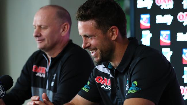 Port Adelaide’s Travis Boak announces he has stepped down as captain of the Power, flanked by coach Ken Hinkley. Picture: Tait Schmaal