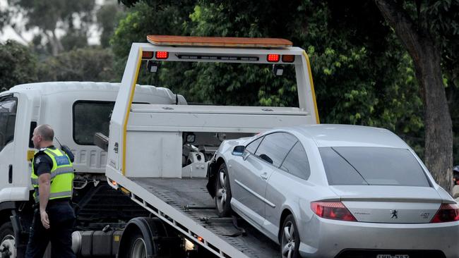 Police at the scene where Mitat Rasimi died on Dawn Ave, Dandenong. Picture: Andrew Henshaw