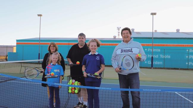 Sheryl Windle, Maggie Stevens, Nathan Costello, Charlotte Stevens and Marco Gliori celebrate Warwick and District Tennis Association's grant.