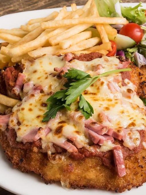 Cafe Paparazzi’s chicken parmi. Picture: Supplied