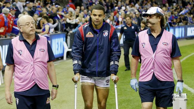 AFL Round 4. Carlton v Western Bulldogs at Etihad Stadium. Jadon Johannisen on crutchers after game . Pic: Michael Klein.