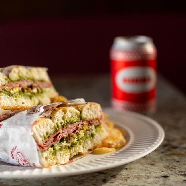 Westside Laundry in West Hobart. Morty – mortadella, stracciatella cream, pistachio pesto, basil. Pictured with a Birra Beer. Picture: Cassie Sullivan