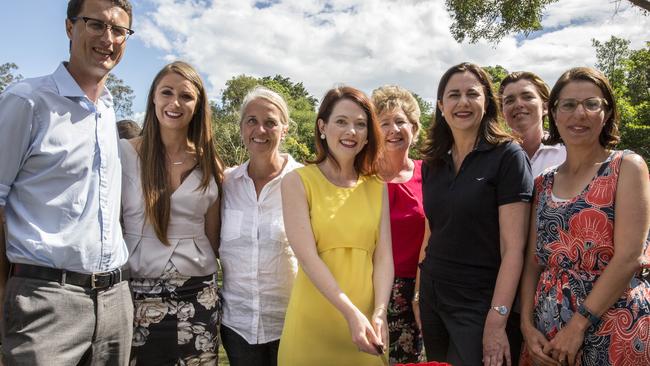 Annastacia Palaszczuk cuts a cake with winning Labor candidates at a barbecue at Rocks Riverside Park, Seventeen Mile Rocks. Picture: AAP.