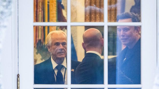 Peter Navarro and Elon Musk speaking inside the Oval Office last month. Picture: AFP