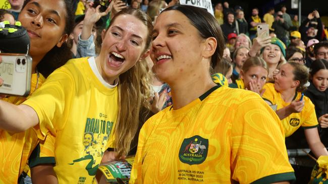 PERTH, AUSTRALIA - OCTOBER 26: Sam Kerr of the Matildas takes a selfie with fans after the win during the AFC Women's Asian Olympic Qualifier match between Australia Matildas and IR Iran at HBF Park on October 26, 2023 in Perth, Australia. (Photo by James Worsfold/Getty Images)