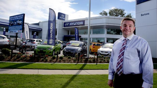 Mark Beitz in front of Bartons’s Hyundai showroom at Wynnum. Picture: Chris Higgins