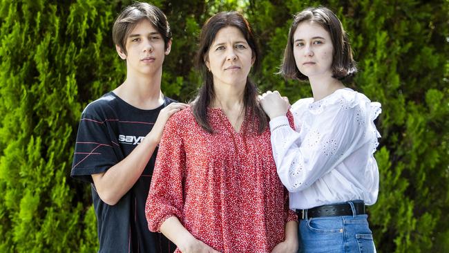 Ivan, left, Natalia and Dasha Garmash fled Ukraine for Melbourne after Russian invaders began shelling their hometown of Kharkiv. Picture: Aaron Francis