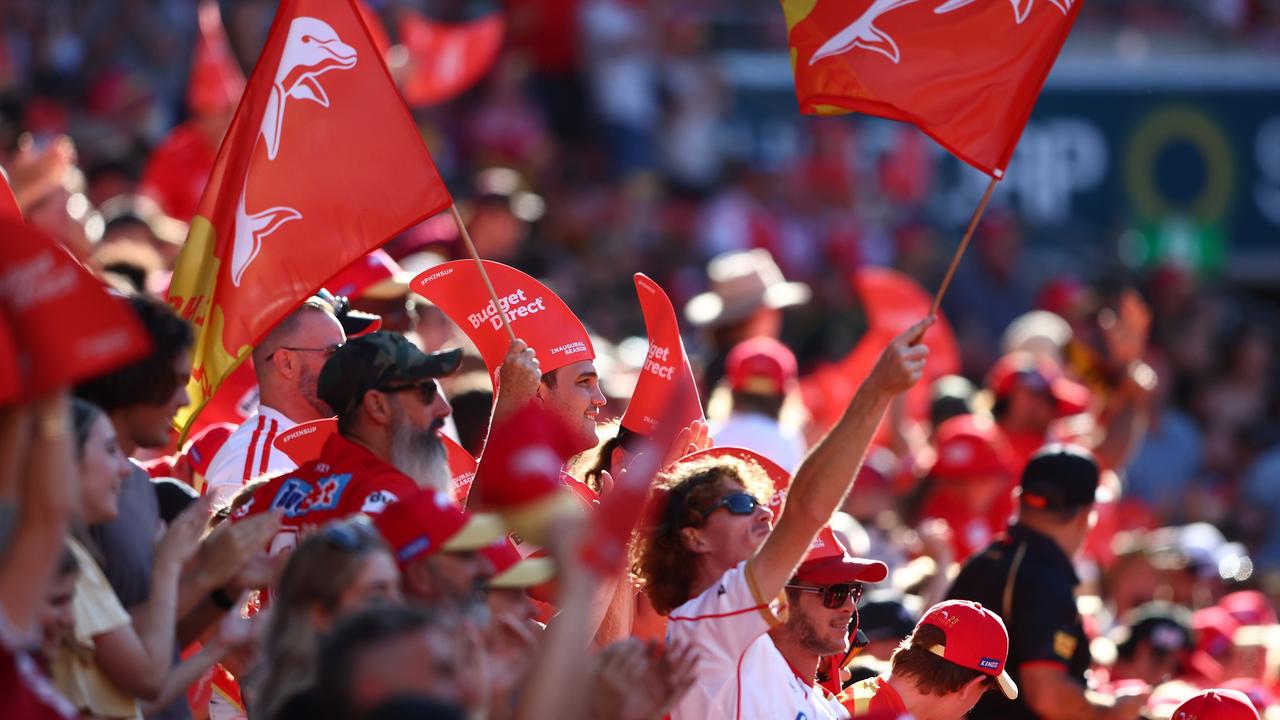 BRISBANE, AUSTRALIA - MARCH 05: Dolphins fans cheer during the round one NRL match between the Dolphins and Sydney Roosters at Suncorp Stadium on March 05, 2023 in Brisbane, Australia. (Photo by Chris Hyde/Getty Images)