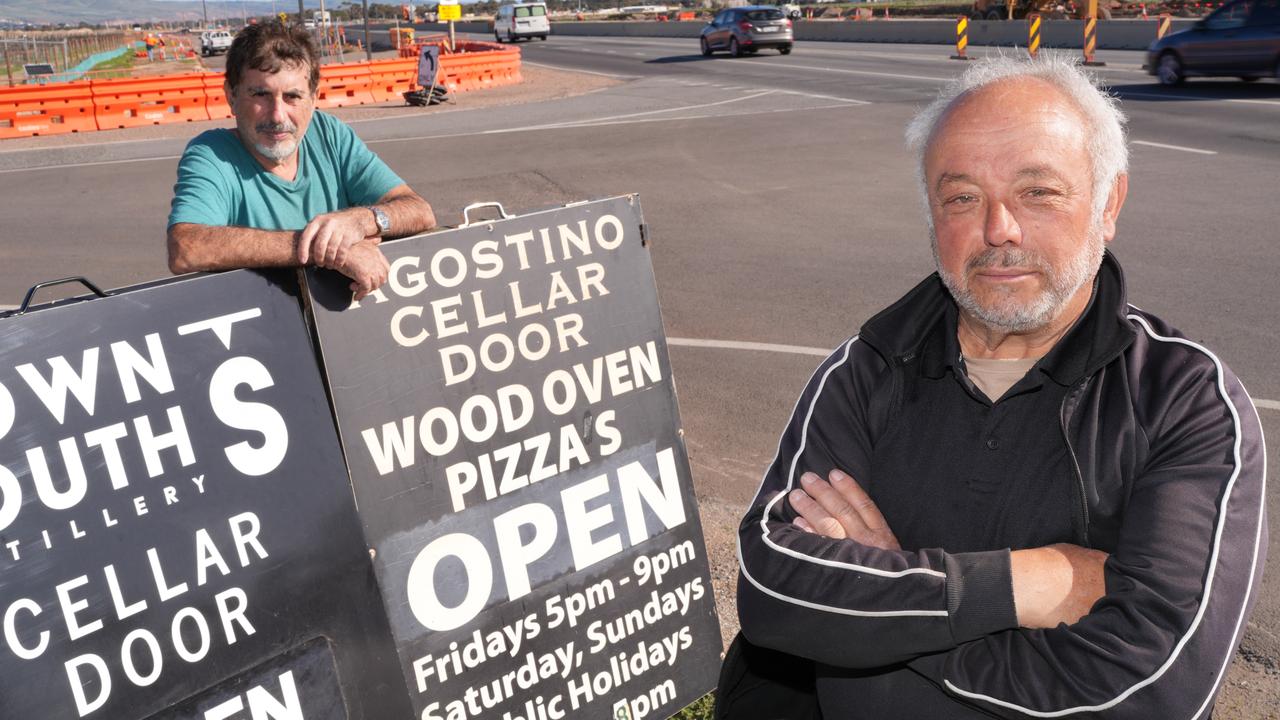 Agostino Wines owner Joe Agostino (right) and staff member Giulio Dichiera believe the roadworks may force them to close. August 7 2024. Picture: Dean Martin