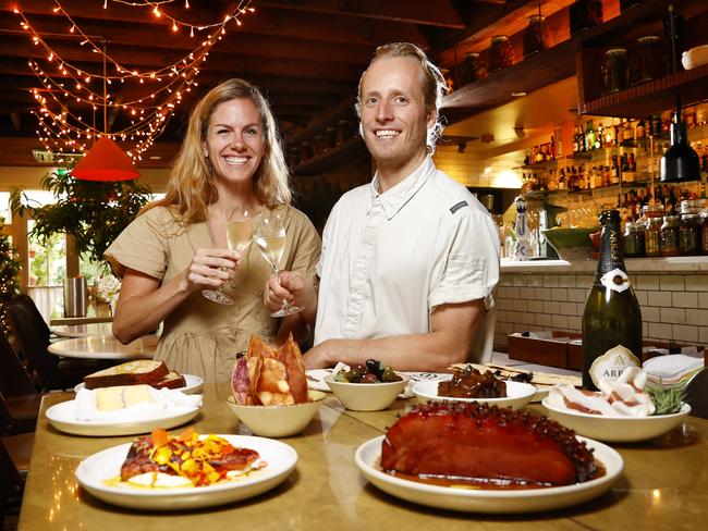 Chiswick general manager Anna Zaganelli and head chef Taylor Cullen with items in the restaurant’s Christmas Delivery Hamper. Picture: Richard Dobson