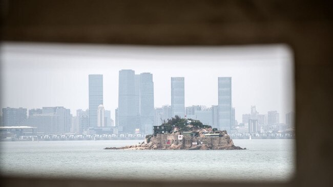 Shiyu, or Lion Islet, one of Taiwan’s offshore islands, seen through a gun emplacement in the Chinese city of Xiamen. Picture: Getty Images