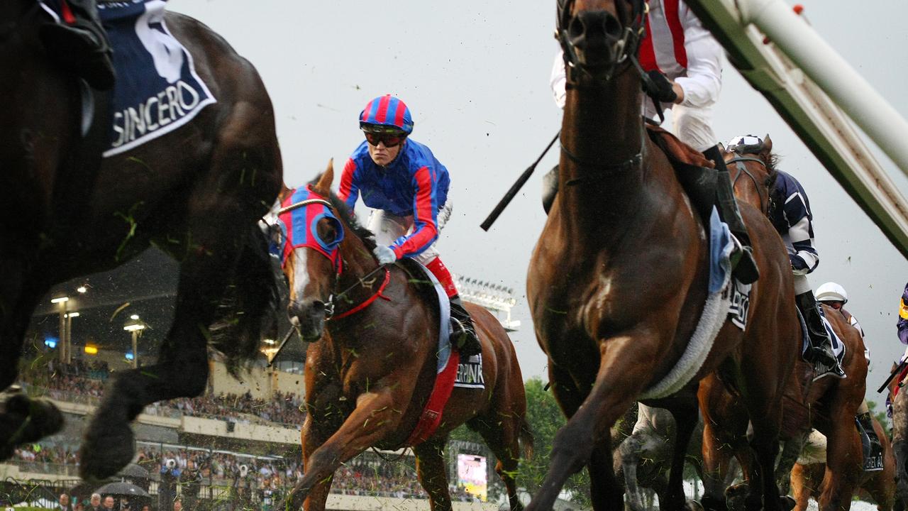 Craig Williams rides Pinker Pinker past the post for the first time before the win in the 2011  Cox Plate. Moonee Valley.