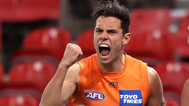 Giants Josh Kelly celebrates kicking a goal  during AFL match between the GWS Giants and Collingwood at Giants Stadium. Picture. Phil Hillyard