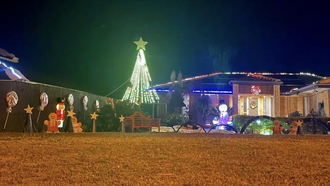 Neighbours, Trevor Funnel and Adrian Simpson have a combined effort on their Victoria Point display, with the addition of a synchronised music sequence. Picture: Supplied.