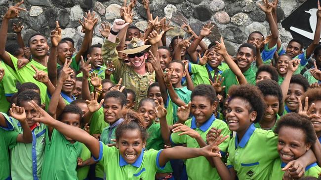 Soldiers from 3rd Brigade on Pacific deployment during the Anzac day period. Soldiers from the Australian ArmyÃ&#149;s 3rd Brigade visit students at Situm 7th Australian Division Memorial Primary School in Lae, PNG. Picture: Supplied