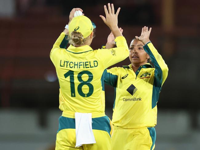 SYDNEY, AUSTRALIA - FEBRUARY 10: Alana King of Australia celebrates with Phoebe Litchfield of Australia after dismissing Nadine de Klerk of South Africa during game three of the women's One Day International series between Australia and South Africa at North Sydney Oval on February 10, 2024 in Sydney, Australia. (Photo by Cameron Spencer/Getty Images)