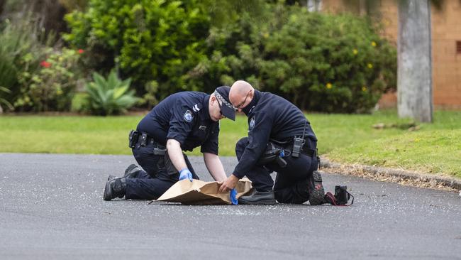 Investigators at a police incident in Harristown, Friday, May 6, 2022. Picture: Kevin Farmer