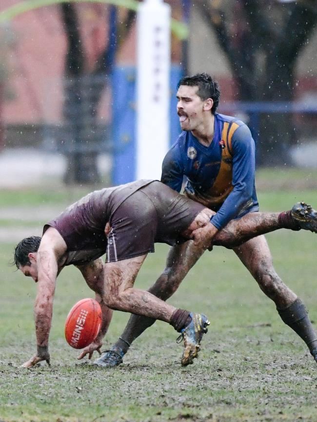 Darius King is tackled by James Daly during Colonel Light Gardens’ division four game against Mitcham. Picture: AAP/Morgan Sette