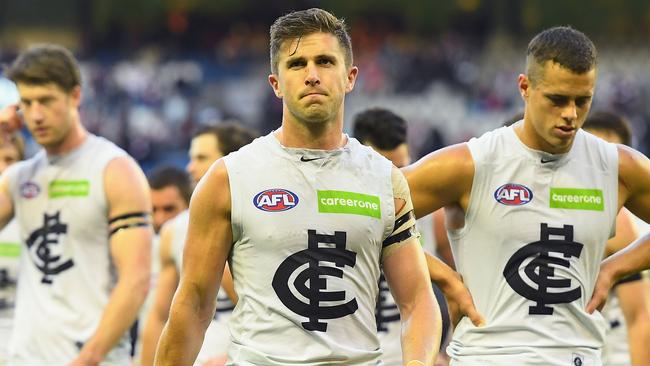 Marc Murphy walks off the field after he was taunted by Saints players. Picture: Getty Images