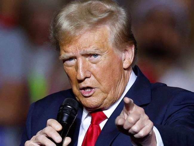 Former US President and Republican presidential candidate Donald Trump gestures as he speaks at a campaign rally at the Fiserv Forum in Milwaukee, Wisconsin, November 1, 2024. (Photo by KAMIL KRZACZYNSKI / AFP)