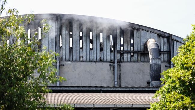 A large structure fire at the Cairns Regional Council's waste transfer station at Portsmith has been burning for more than a week. It’s feared that workers inside the station’s Advanced Resource Recovery Facility may lose their jobs. Picture: Brendan Radke