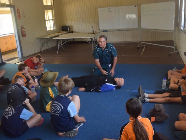 EMERGENCY INSTRUCTION: Officer in Charge of the Biloela Ambulance Service Terry Zillman teaches students vital CPR knowledge at the Biloela PCYC.