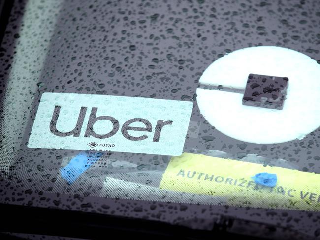 (FILES) In this file photo the Uber logo is displayed on a car on March 22, 2019 in San Francisco, California. - Uber unveiled plans on July 7, 2020 to launch grocery delivery through its recently acquired subsidiary Cornershop. The new service will roll out in cities in Canada and Latin America this week, and in the United States later this month. (Photo by JUSTIN SULLIVAN / GETTY IMAGES NORTH AMERICA / AFP)