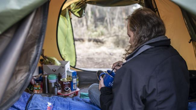 Scott, a man who was forced to live in his tent due to the housing crisis.