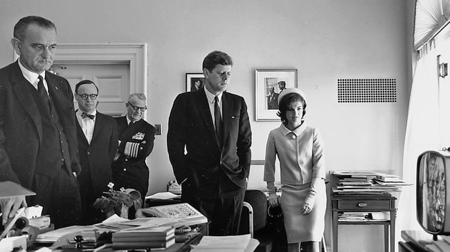 Arthur M. Schlesinger, second left, in the Kennedy White House in 1961.