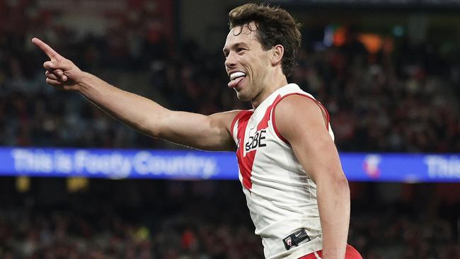 MELBOURNE, AUSTRALIA - AUGUST 16: Oliver Florent of the Swans celebrates kicking a goal during the round 23 AFL match between Essendon Bombers and Sydney Swans at Marvel Stadium, on August 16, 2024, in Melbourne, Australia. (Photo by Daniel Pockett/Getty Images)