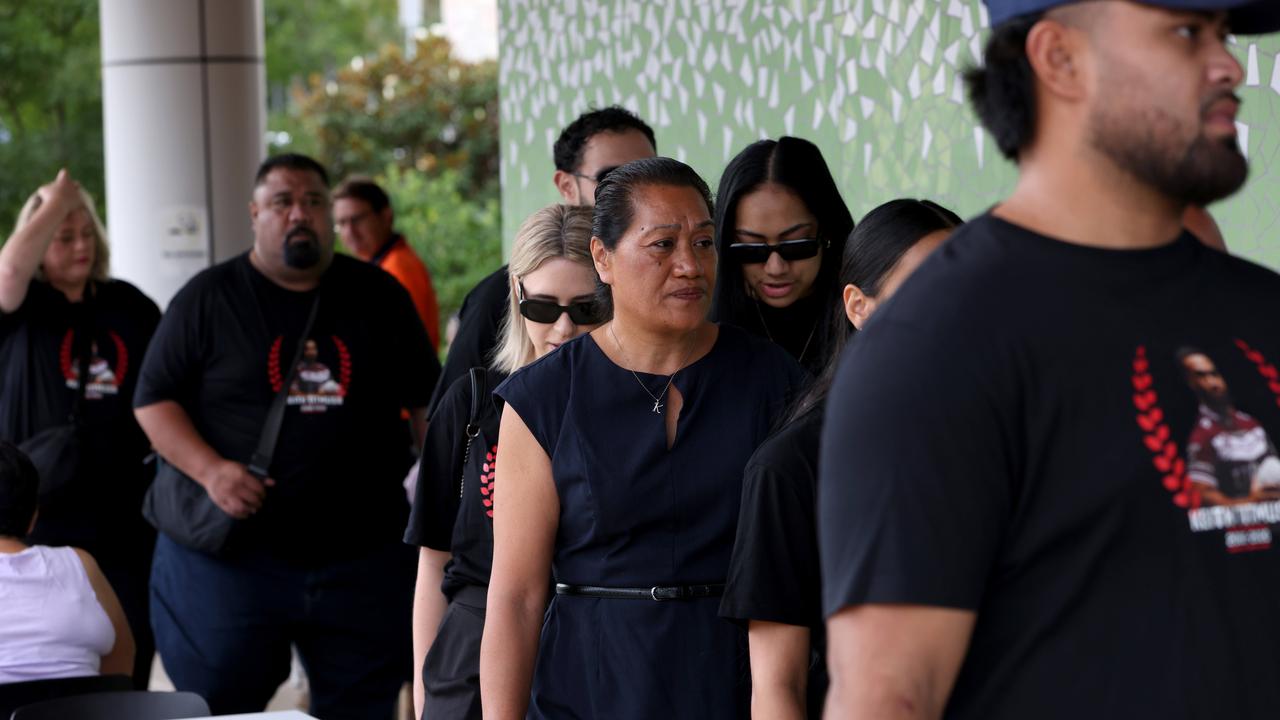 His mother, Lafo Titmuss pictured (centre) as she arrives at Lidcombe Coroners Court. Picture: NCA NewsWire / Damian Shaw